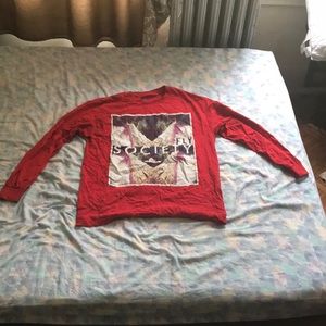 This item is a red long sleeve fly society shirt